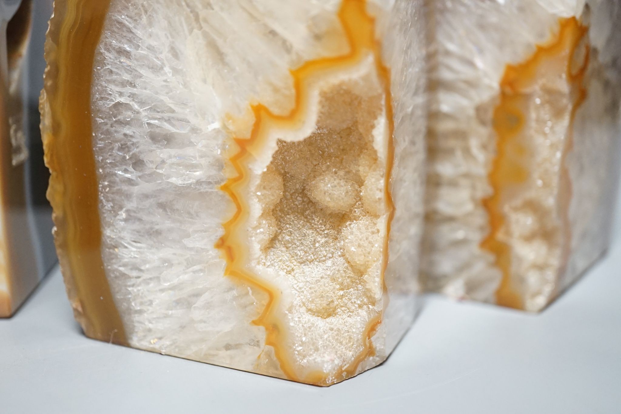 Three pairs of agate geode and a pair of slate bookends